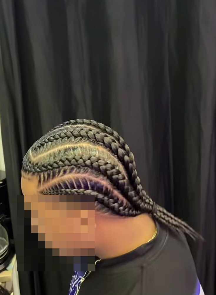 Wide braids running in waves across the head, with fine feather patterns in between