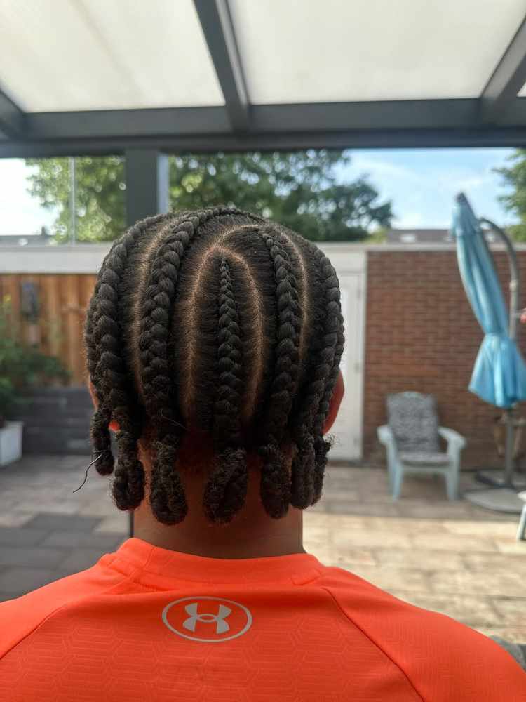 Zigzag back, seen from behind, with loose curling ends at the nape